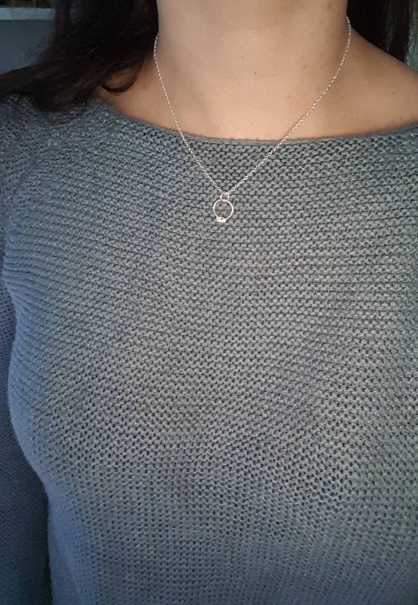 Contemporary sterling silver knot necklace