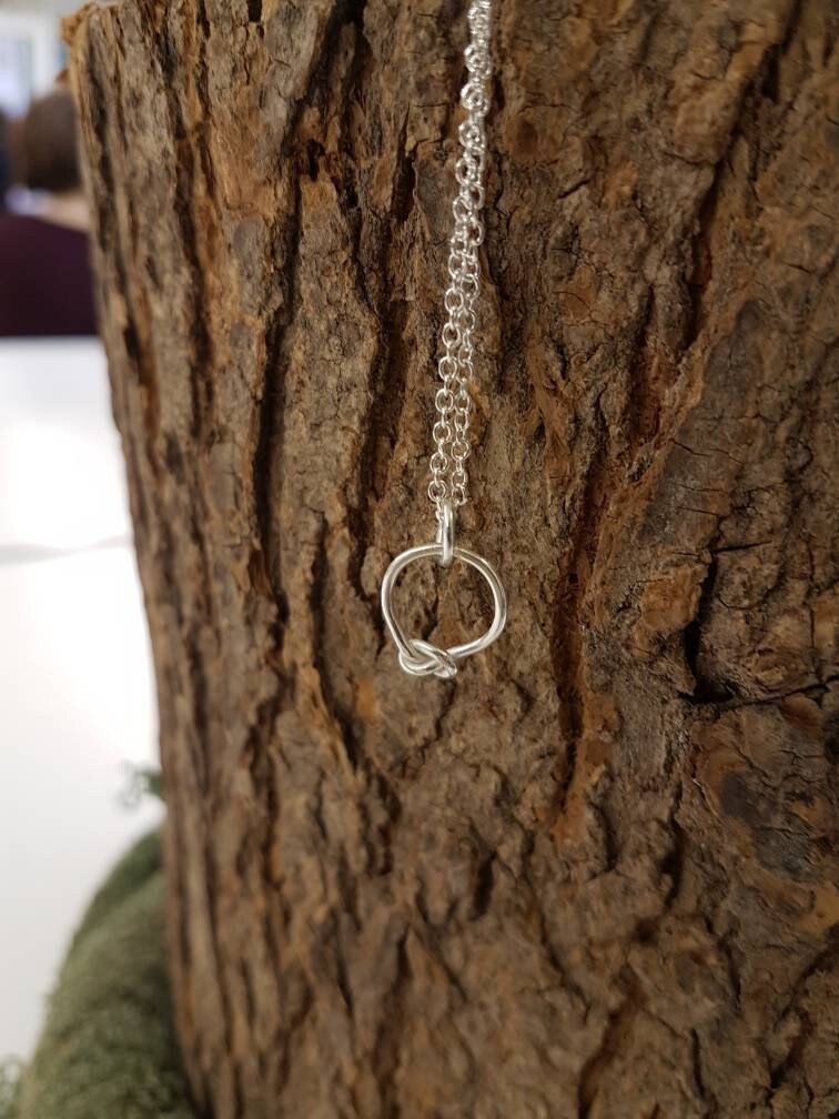 Contemporary sterling silver knot necklace
