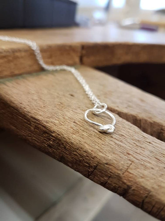 Contemporary sterling silver knot necklace