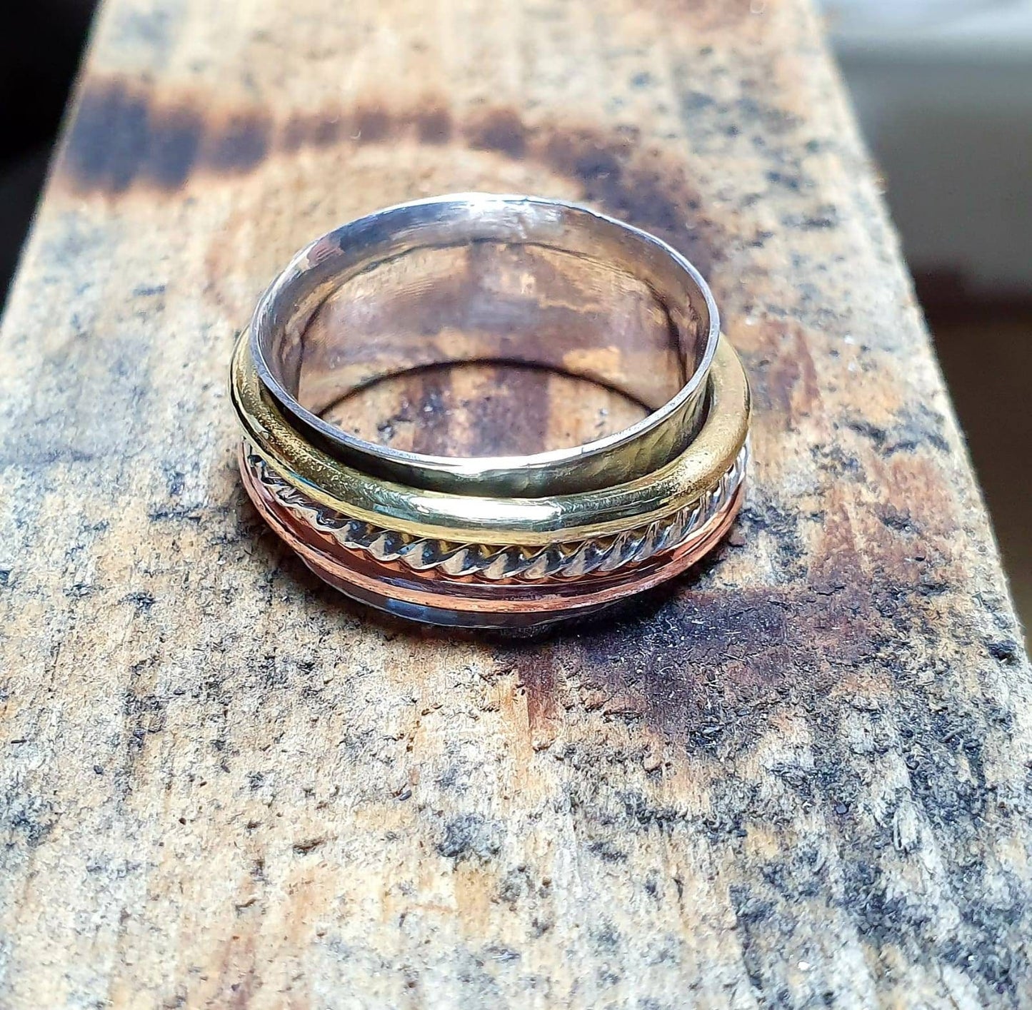 Sterling silver, brass and copper statement spinning Ring