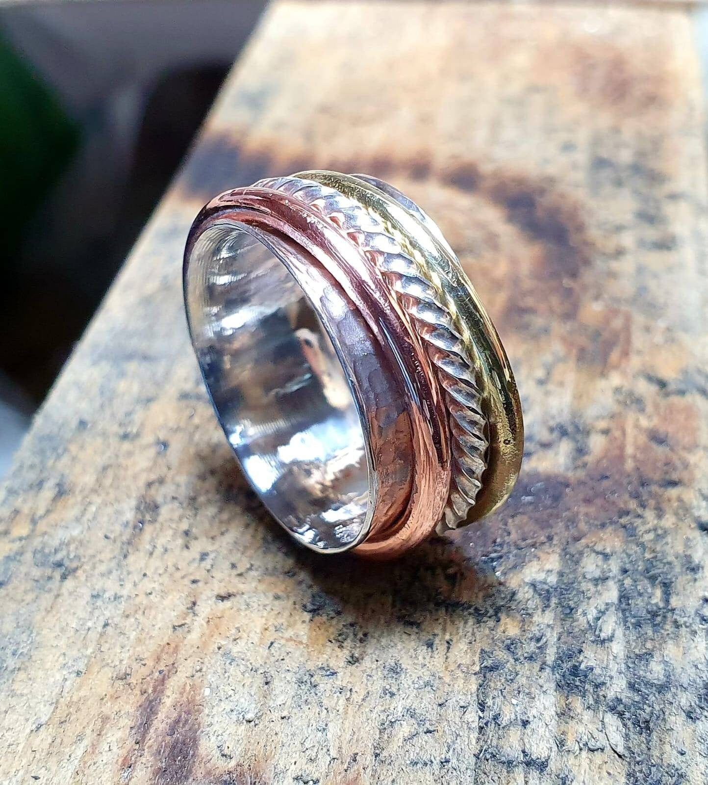 Sterling silver, brass and copper statement spinning Ring